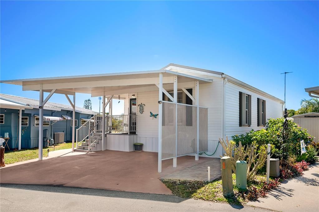 Carport with privacy shade