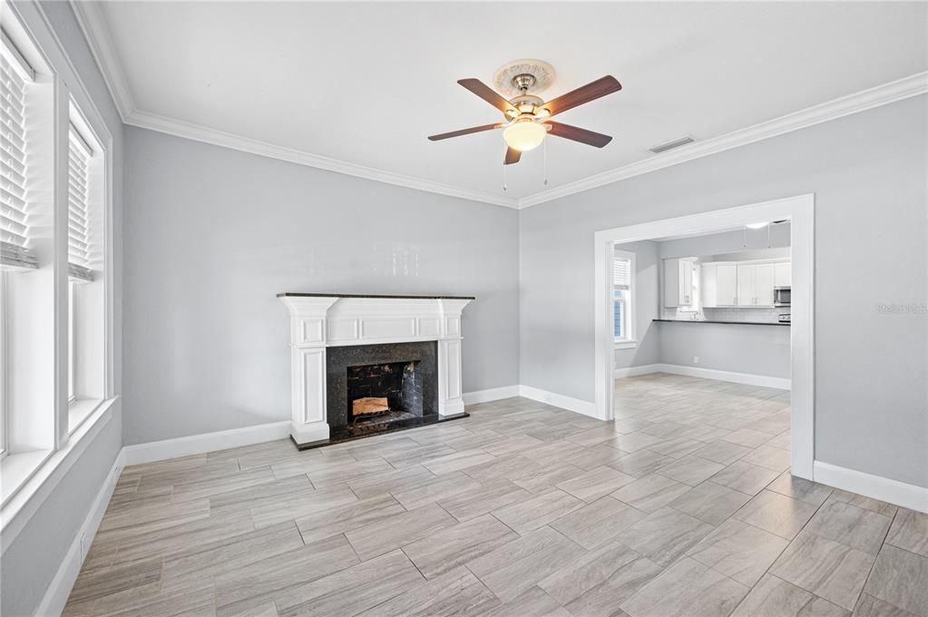 Living room with wood burning fireplace