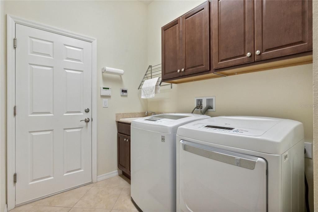 Laundry with sink and storage