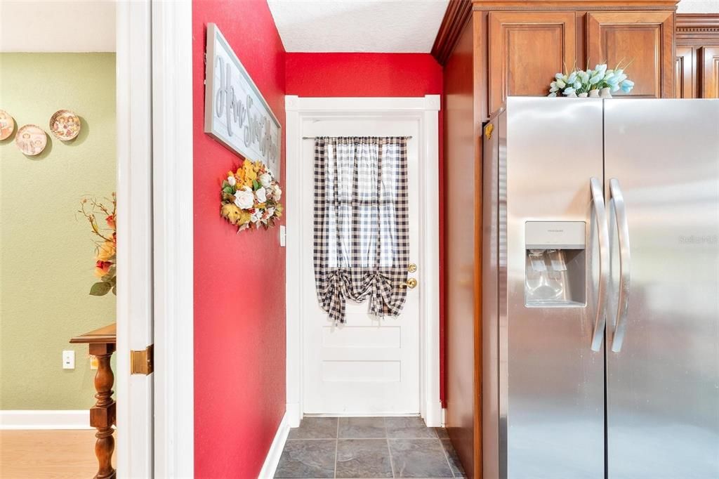 Kitchen with Back Door leading to Back Patio Area