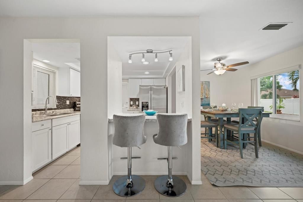 Breakfast Bar Leading to Kitchen/Dining Room