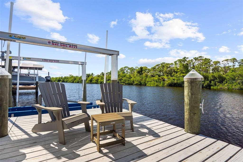 10,000 pound boat lift. Beautiful area to enjoy the sunset!