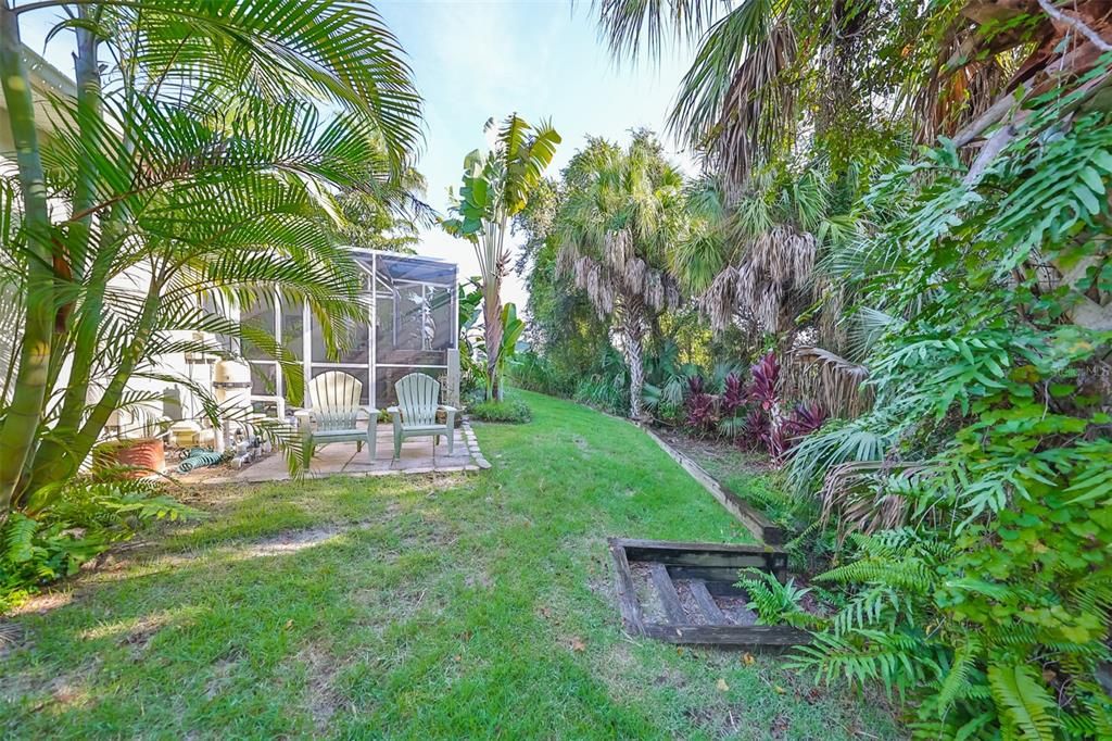 Backyard w/paver sitting area.