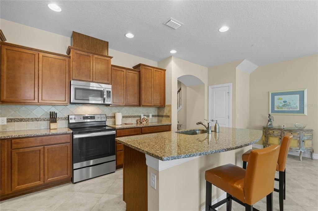 counter-height breakfast bar with seating