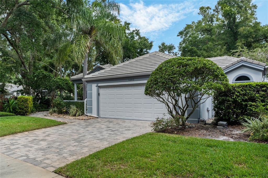 FRONT VIEW WITH BRICK DRIVEWAY & SIDEWALK TO FRONT ENTRY