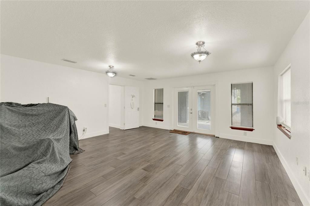 Bonus Room with french doors leading out to backyard.