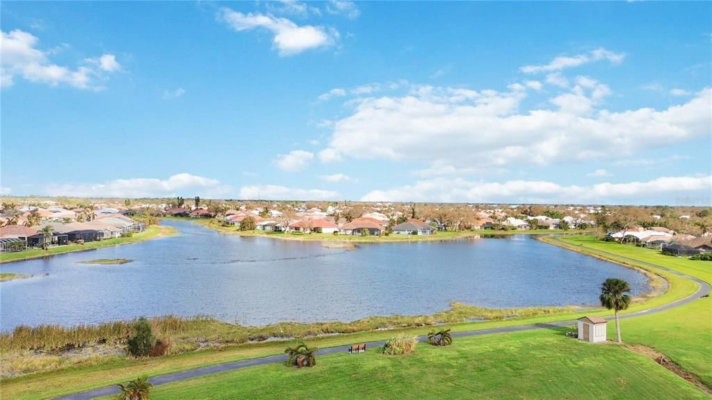 Neighborhood lake with park and trails just a block away.