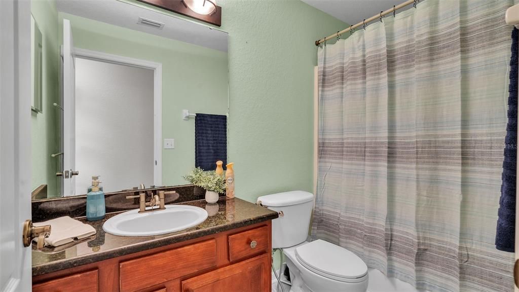 Guest bath with granite counter.