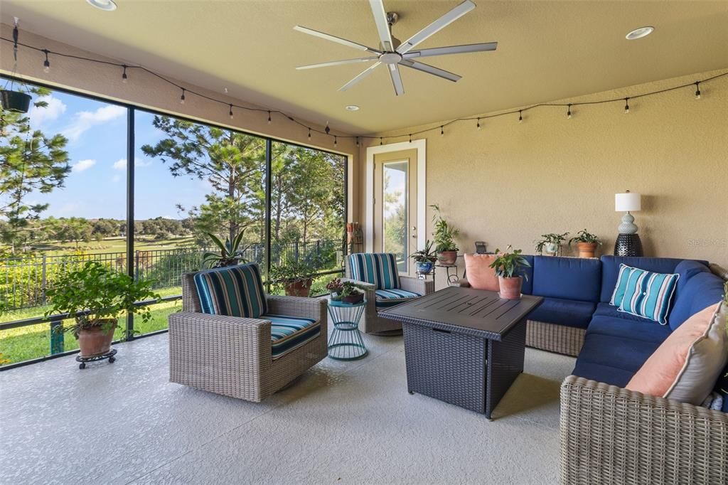 Extended, covered, and screened back patio