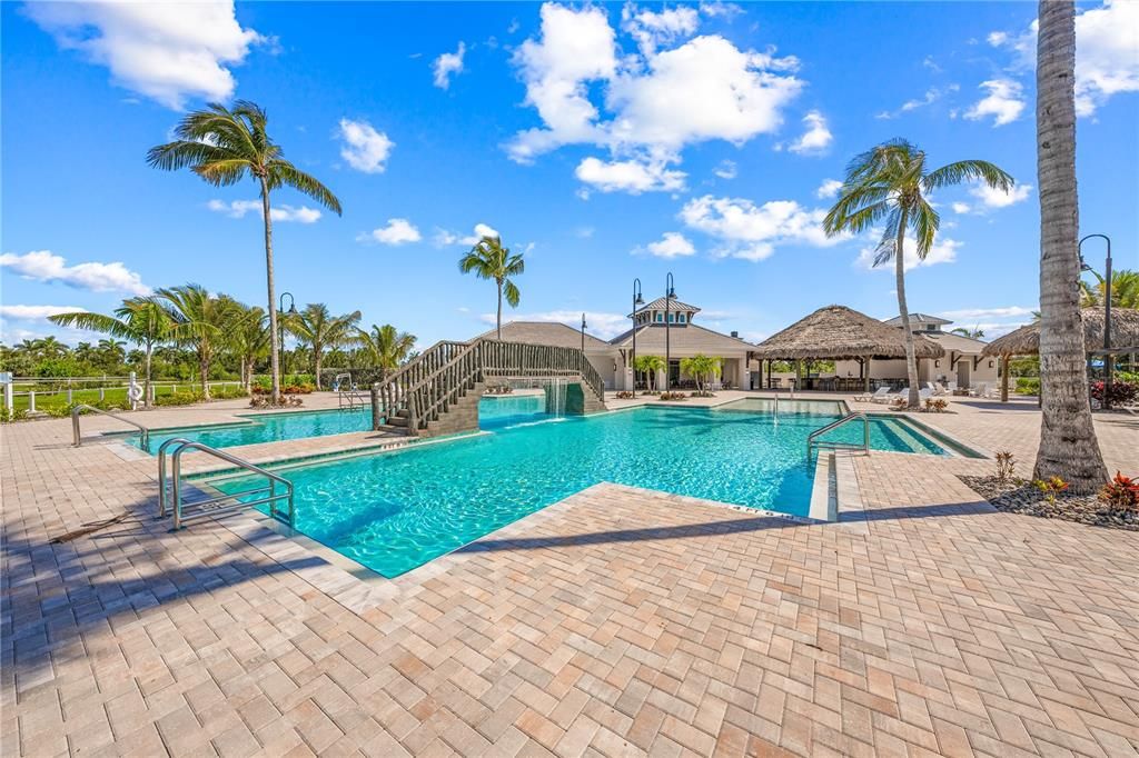 Resort style pool with overhead water bridge