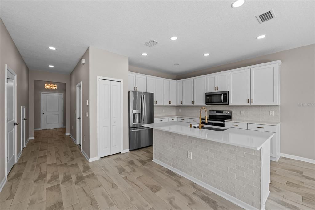 Entryway and Lovely Kitchen