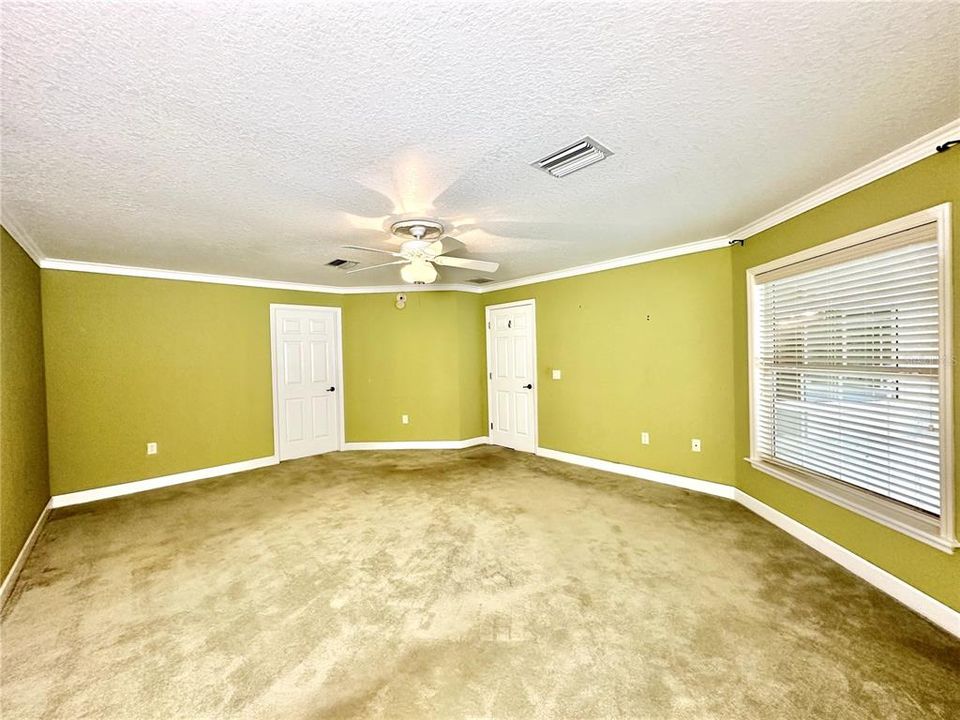 Primary Bedroom - door to the left is bathroom - door to the right goes into living room