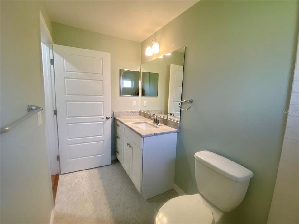 hall bath with granite vanity top