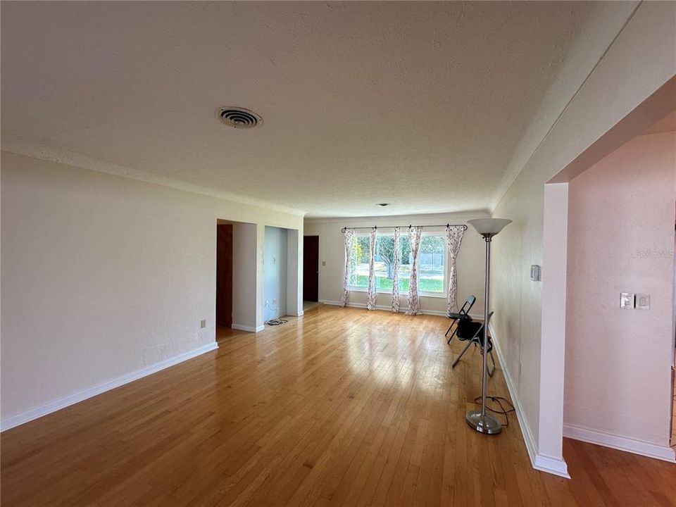 Living Room with Bay Window looking out to Front Yard.