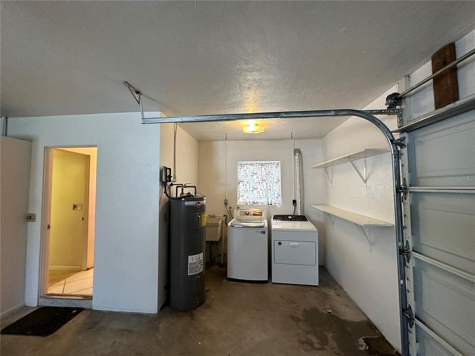 Laundry with sink in Garage