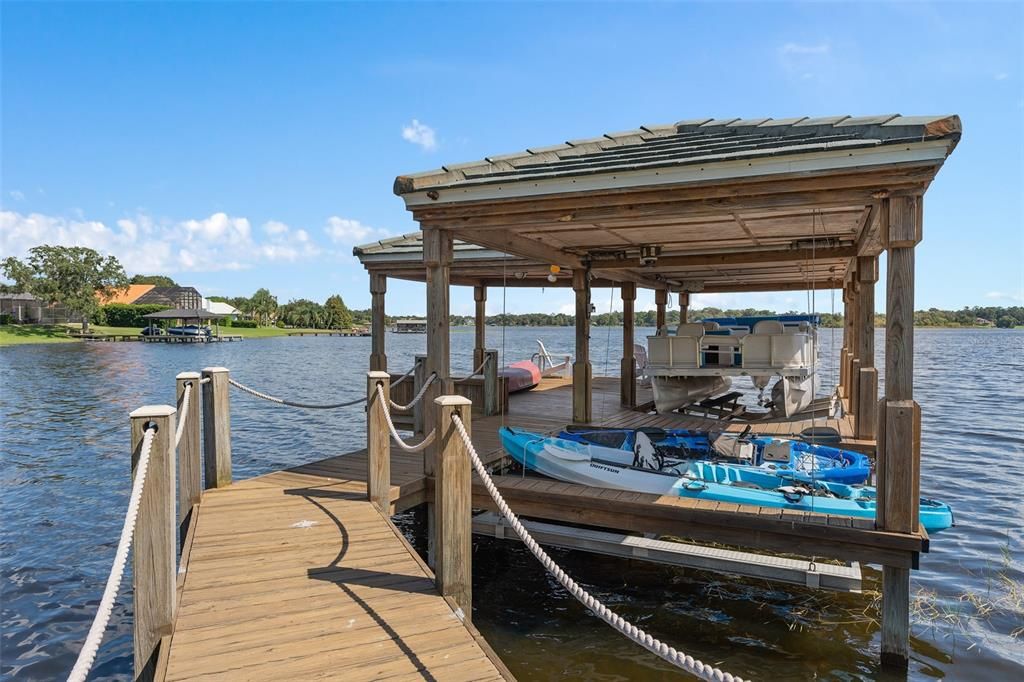 large dock with 2 boat lifts.