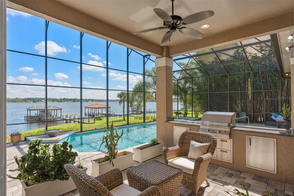 relaxing outdoor area. Complete with built in outdoor kitchen.