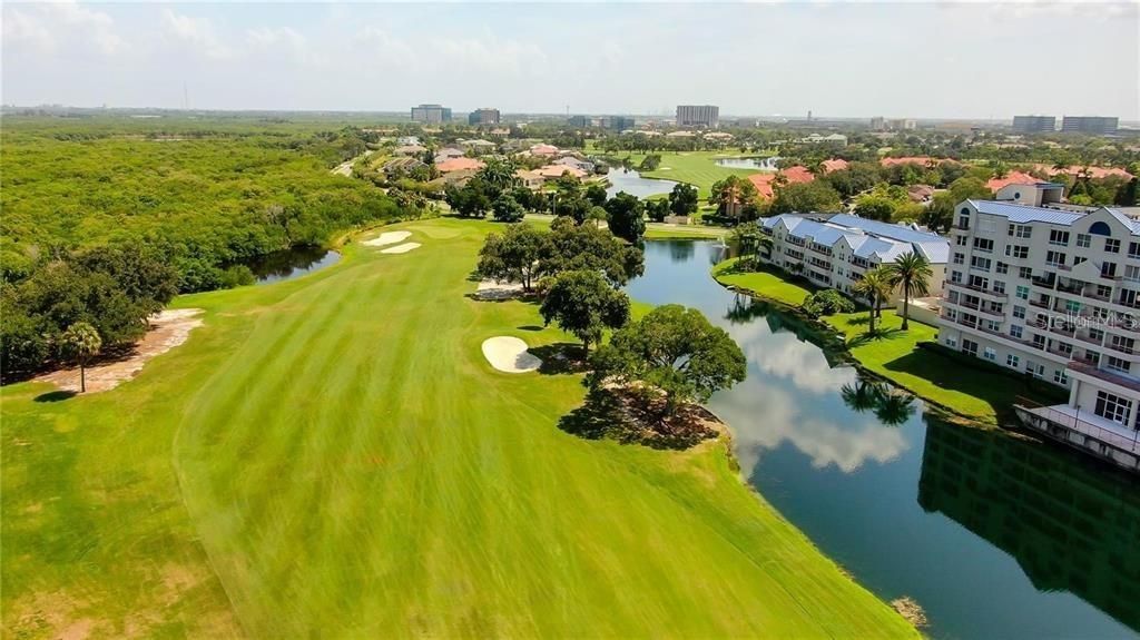 situated on Feather Sound's PGA RATED Golf and Country Club