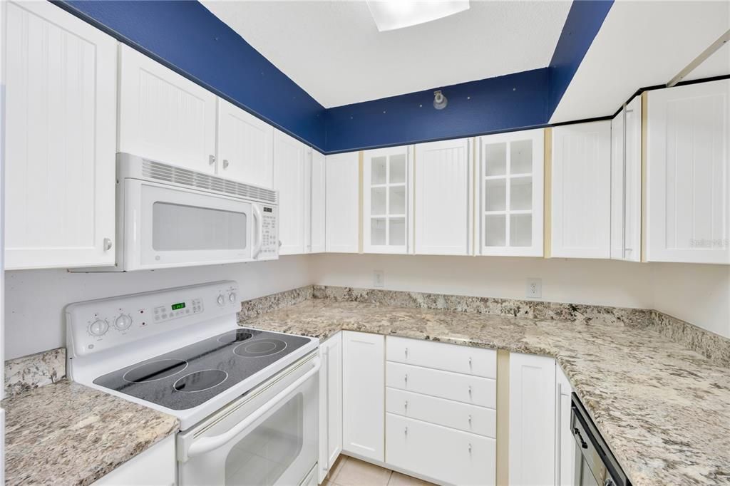 Updated rarely used kitchen!  Cabinets galore, lazy susan additions, like new appliances and more!