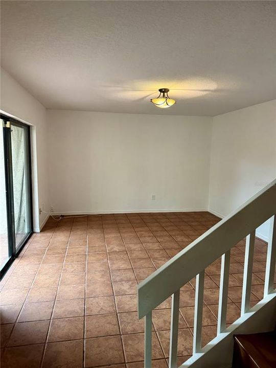 Living Room/ Huge Sliders Open To Courtyard