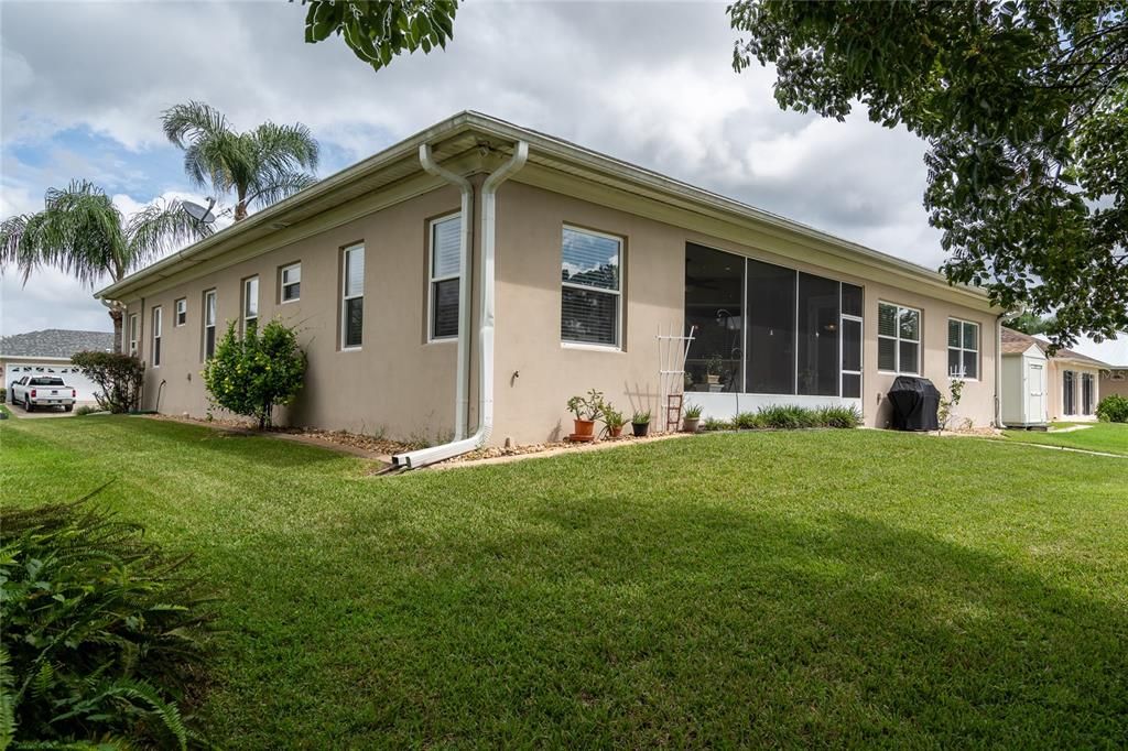 Side/rear of home and the screened lanai.