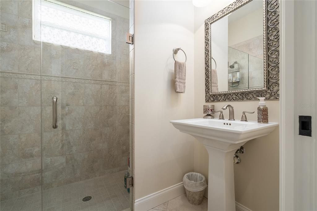 Guest bath near bedroom #2 boasts 3/8 inch glass and 12" center upgraded Price Pfister fixtures.