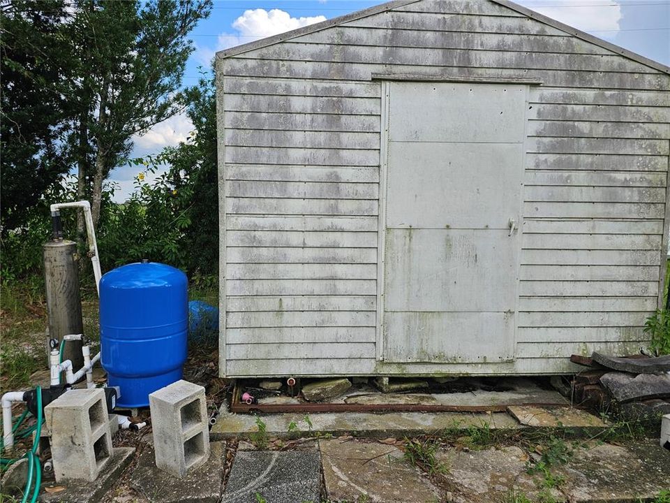 newer well water tank and rented water filtration system.