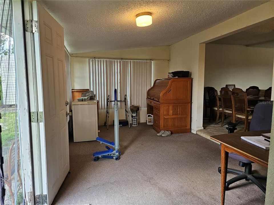 Enclosed porch could be a bonus room or family room.