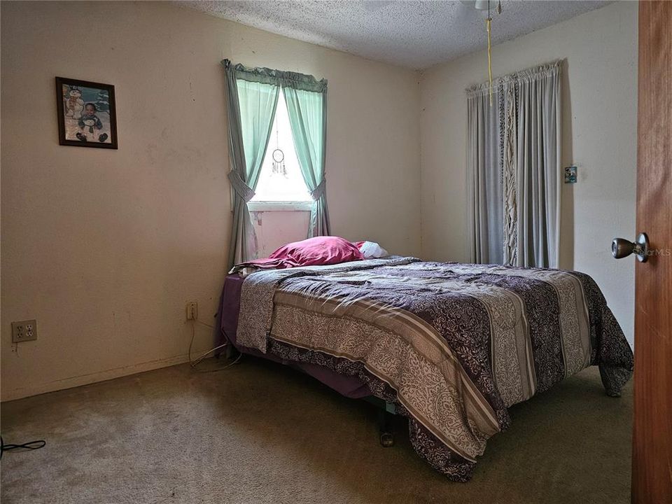 Master bedroom has a walk in closet and en-suite