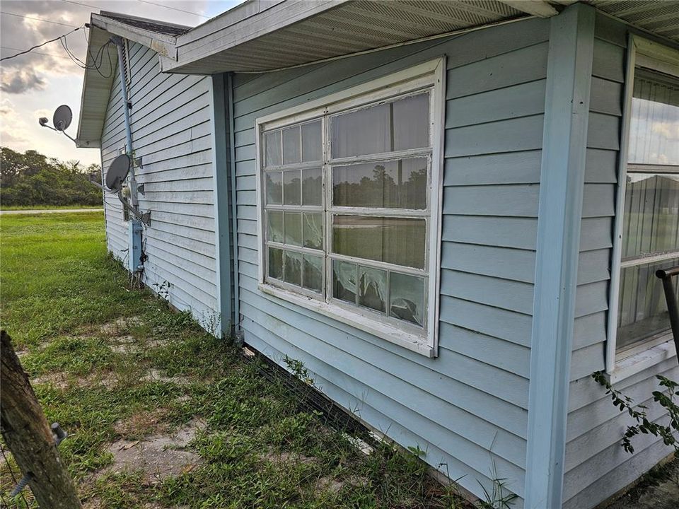 Enclosed porch can be a bonus or office room.