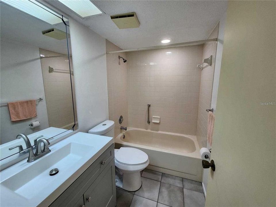 Guest bathroom with bathtub