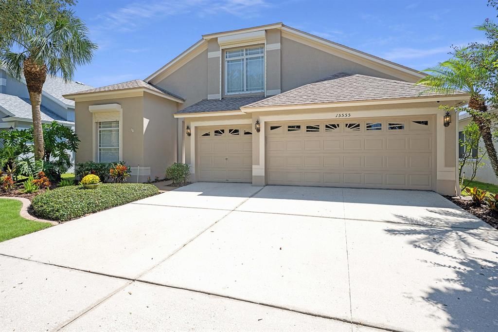 Look at this huge 3-car garage with new paint on walls and floor