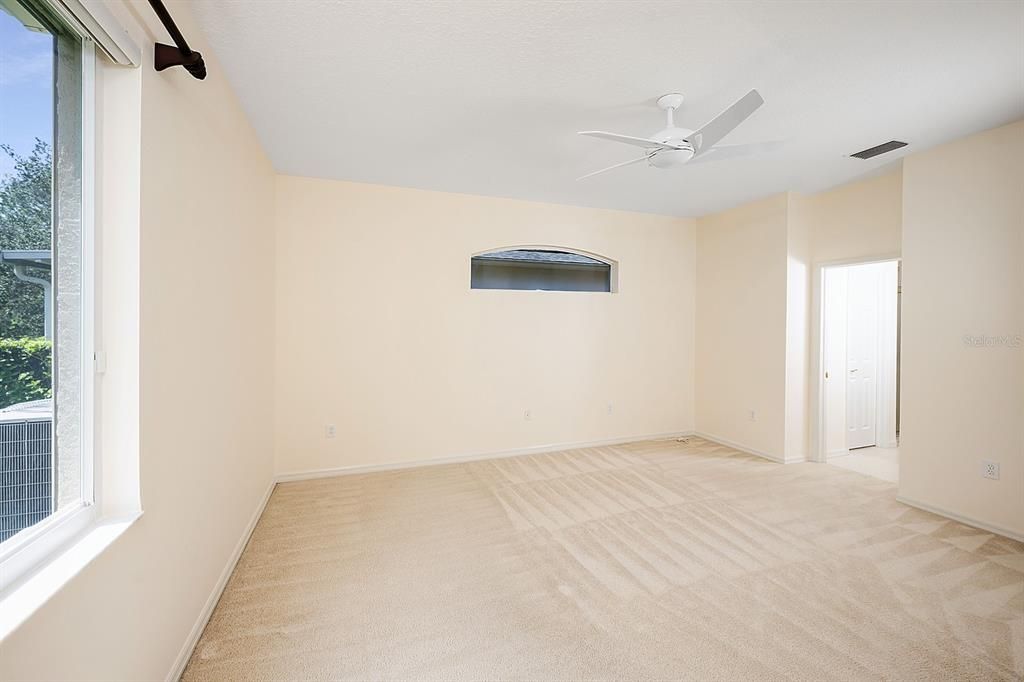 Main bedroom with view into main bathroom