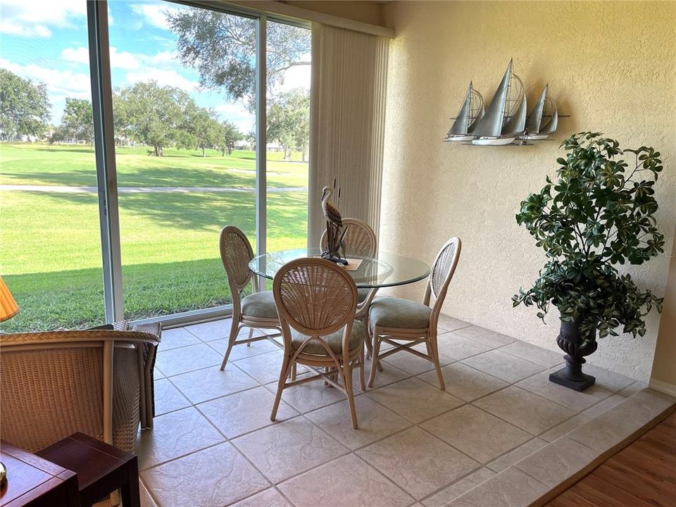 enclosed lanai overlooking 18 fairway