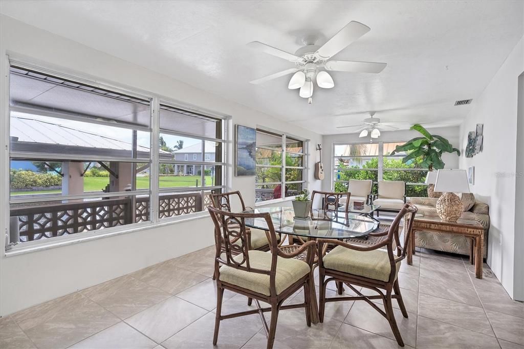 Perfect place to enjoy your water view in the comfort of an air-conditioned sunroom.