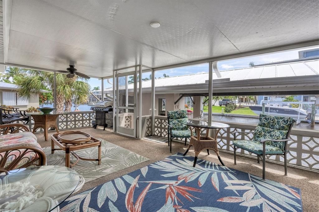 Enjoy the water views from the comfort of this screened in lanai