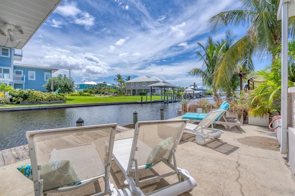 Soak up the sun on the concrete dock while watching for dolphins and manatee