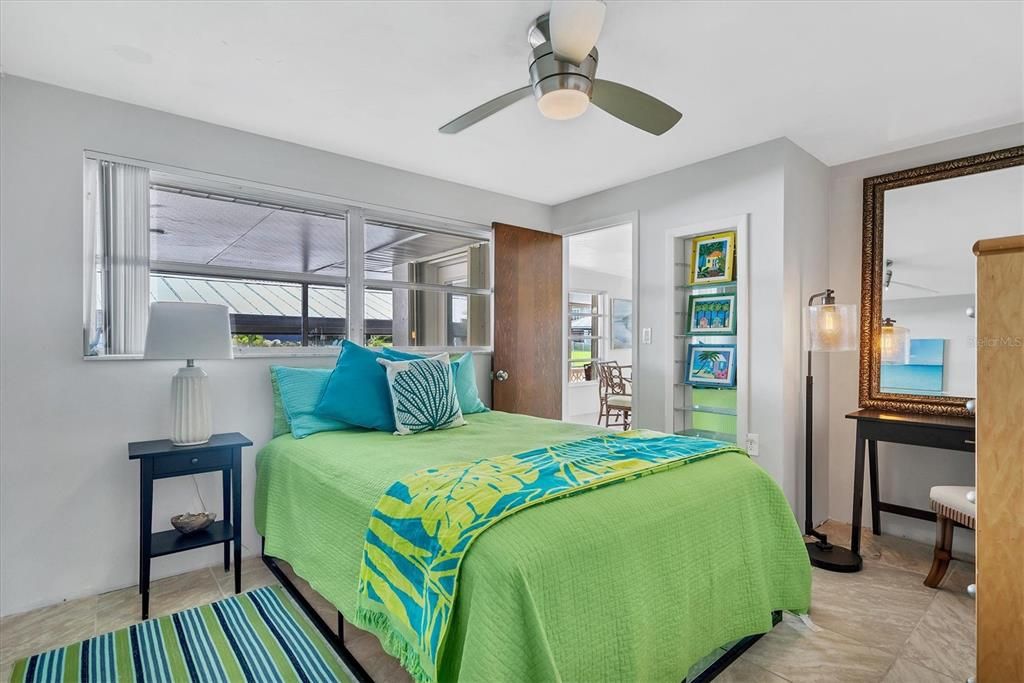 Guest bedroom is connected to the sunroom