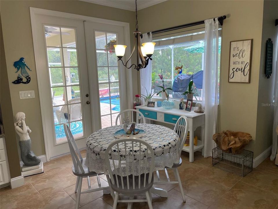 French doors out to pool area