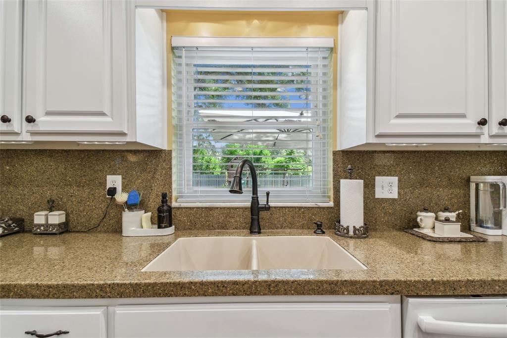 Double sink overlooks the extra-large backyard!