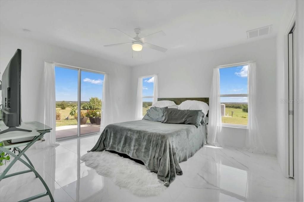 Primary Bedroom with Views of Lake Reedy