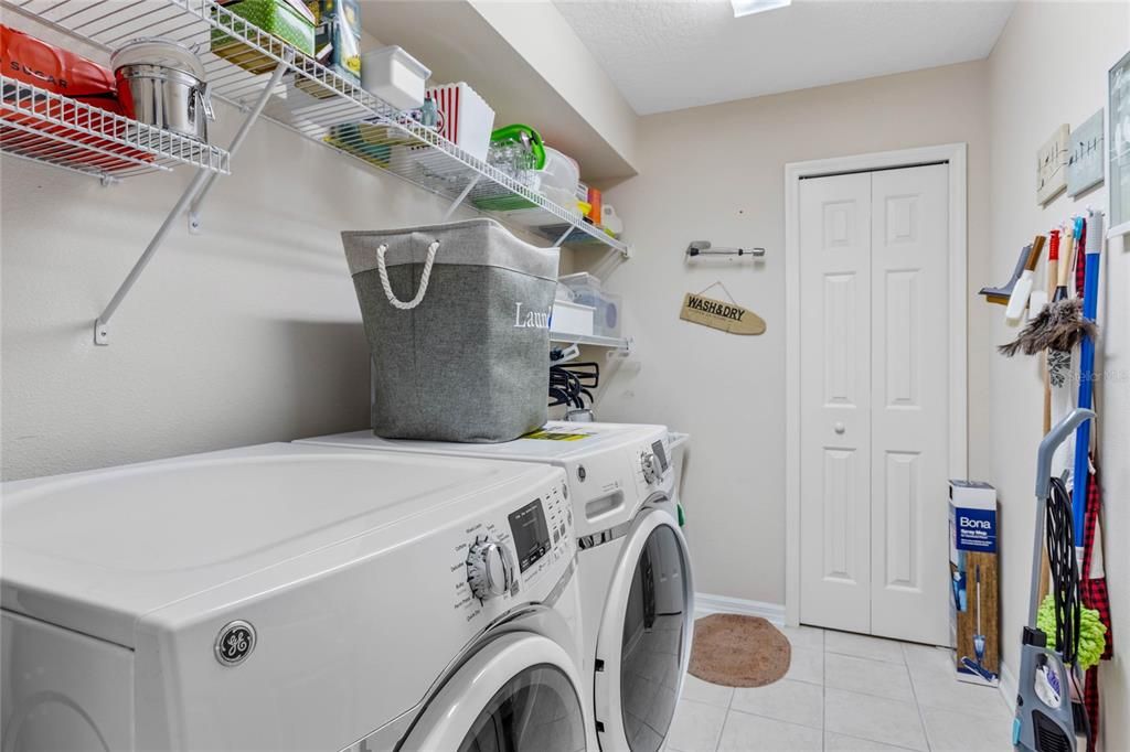 Laundry Room - 6X9 - includes built-in shelves, laundry tub and additional utility closet.