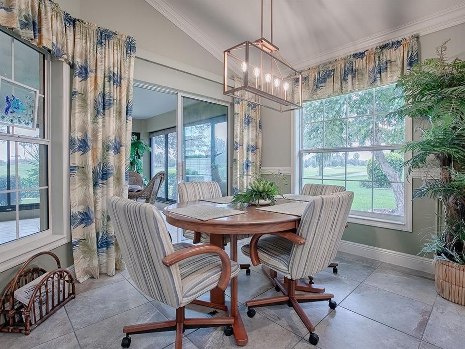 CASUAL DINING AREA WITH CUSTOM VALANCES, DRAPERY, CUSTOM LIGHTING, AND A GREAT VIEW!