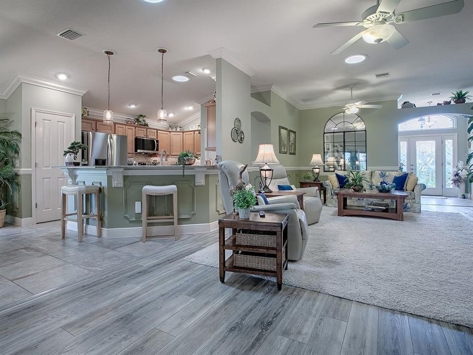 LIGHT AND BRIGHT WITH 3 SOLAR TUBES THROUGHOUT THE LIVING ROOM AND KITCHEN.