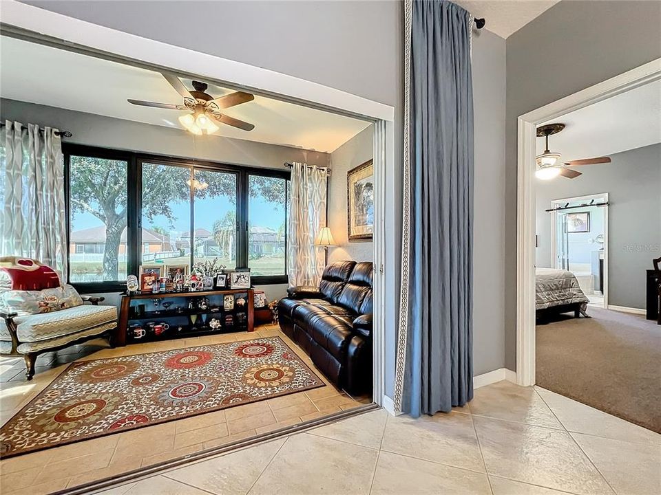 View of the cozy Florida Room which is utilized as additional family space.