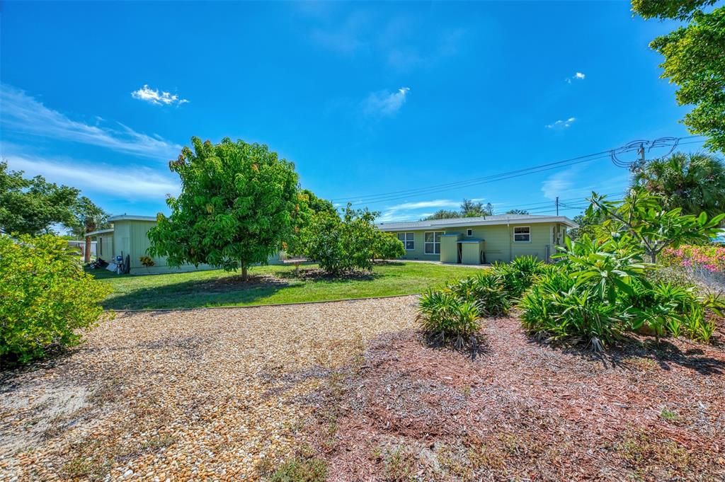 View of the back of the home.  Note the large back yard for many possibilities.