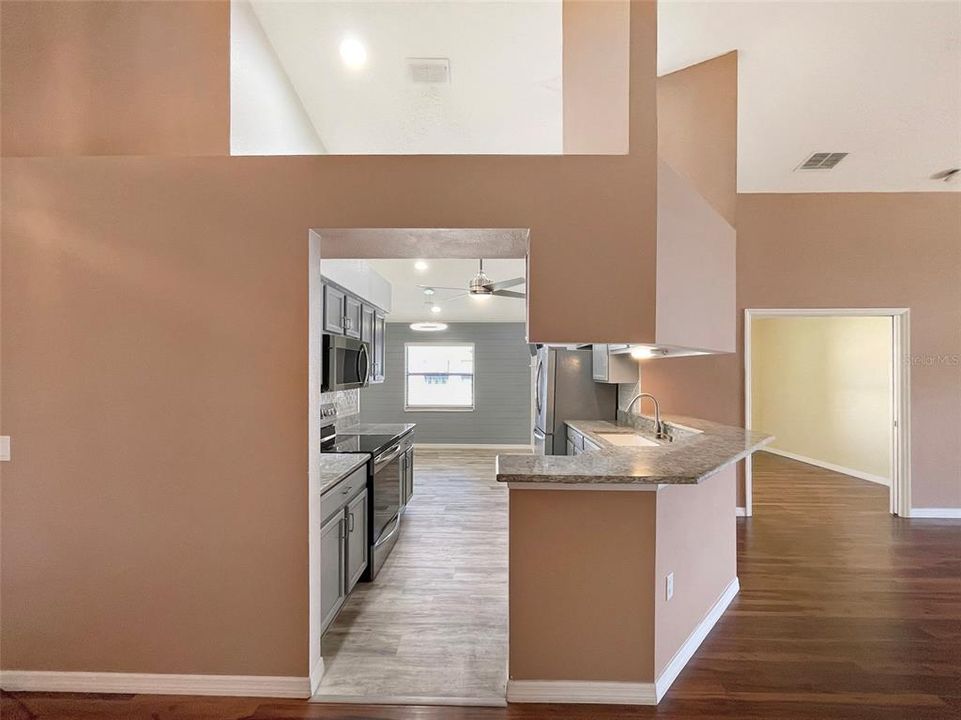 VIEW OF KITCHEN FROM FOYER/DINING AREA