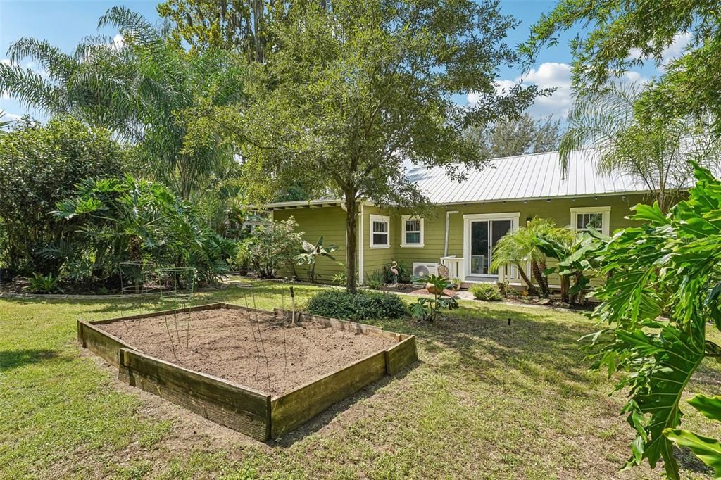 Just waiting for your garden in the side yard of the home.  The sliders and deck is from the second bedroom