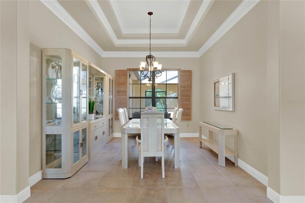 formal dining room accented by a double tray ceiling