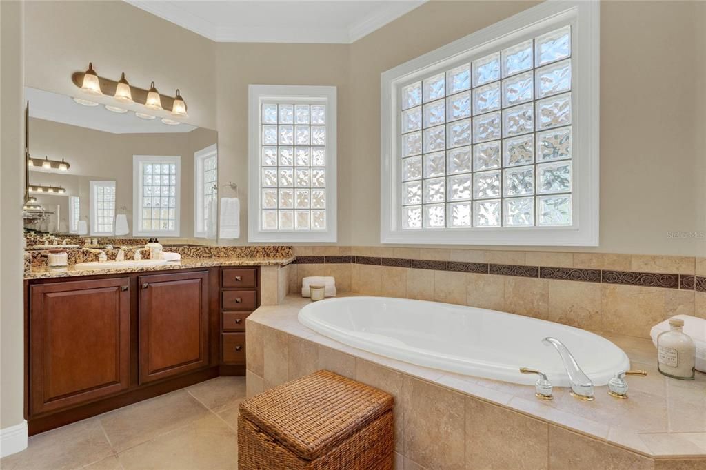 primary bath with single sink vanity area